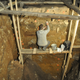Flinders University archaeologist Mike Morley sampling sediment in Denisova Cave.